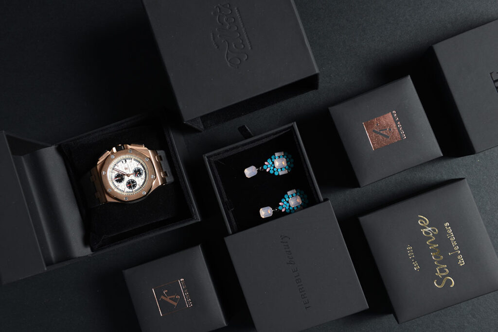 Luxury jewelry boxes and a gift bag